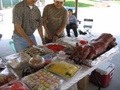 Ong Noi setting up the buffet