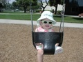 Playing on the swing.